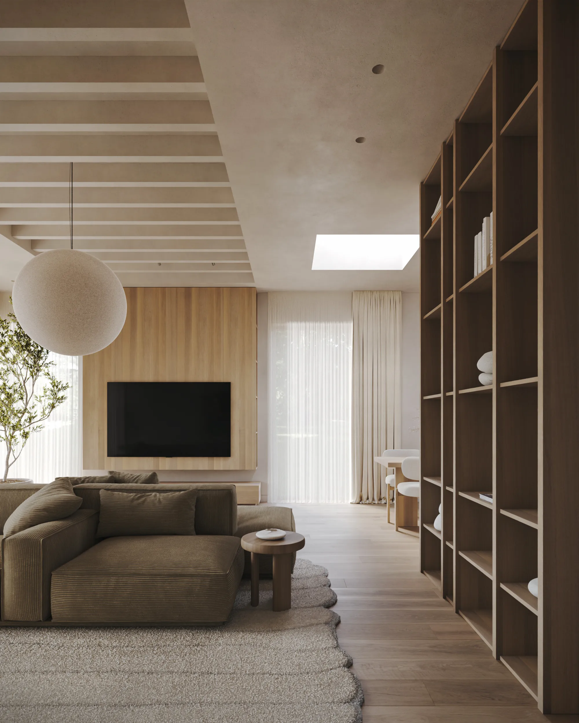 Lion house living room by Ishoro in Kaunas — oak media wall, olive corduroy sofa and full-height bookshelves under a skylight